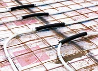 Tubing tied to reinforcing wire mesh